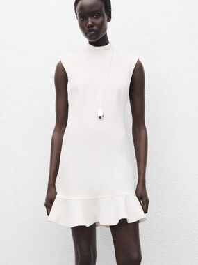 High Neck Sleeveless White Ruffle-Hem Dress